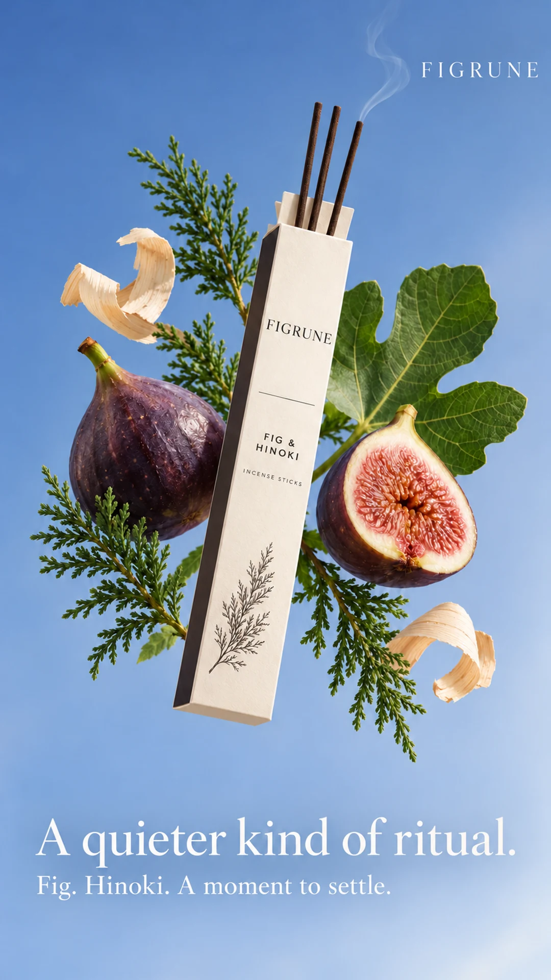 Figrune Fig and Hinoki incense ad with a floating ivory carton, figs and hinoki greenery